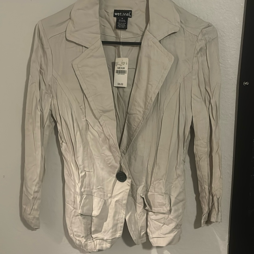 Brand new girls beige medium.